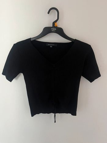 Haut noir hauteur réglable manches courtes décolleté V taille S/M