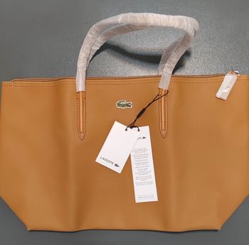 Sa. A bandoulière Lacoste taille L moutarde