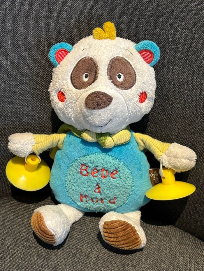 Peluche bébé à bord