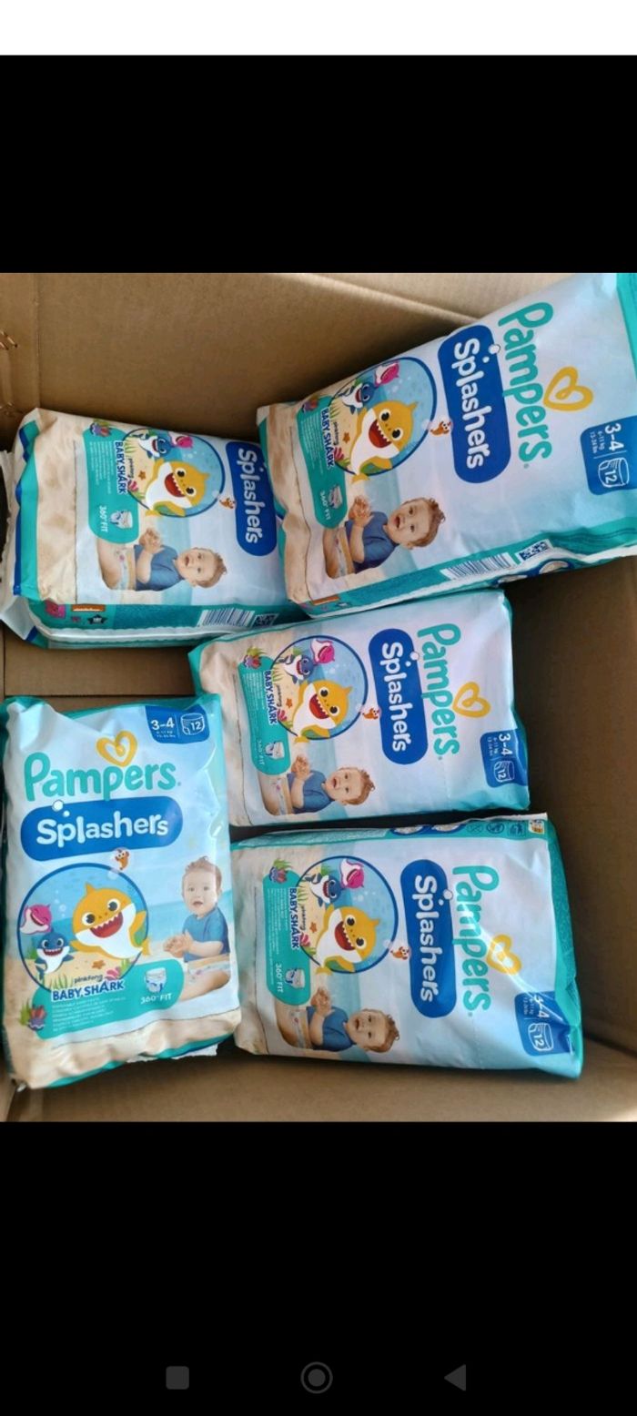 Lot 5 paquets de couches Pampers