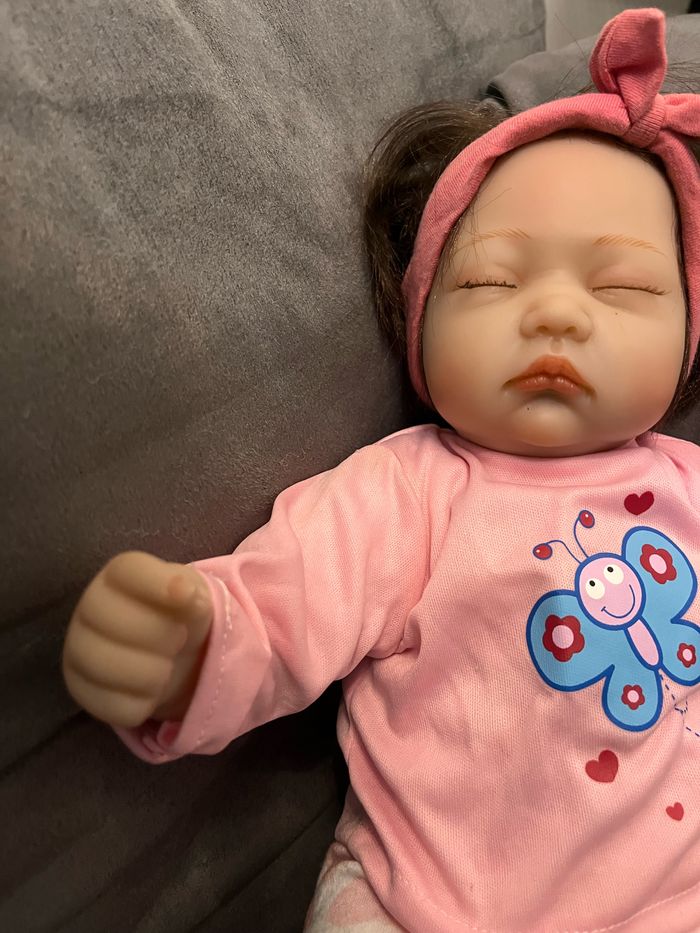 Poupée véritable bébé