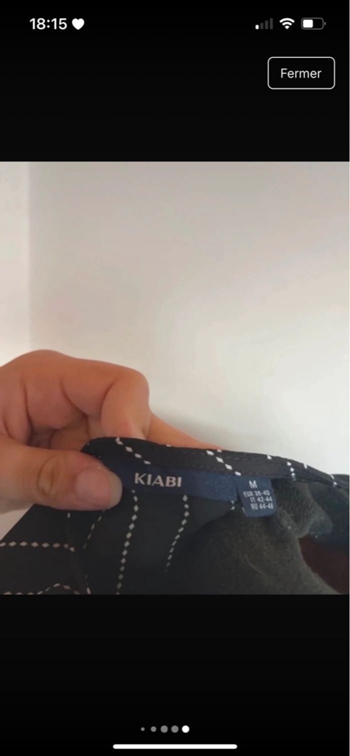 Blouse noir à rayures blanche taille M de chez Kiabi en très bon état - photo numéro 6