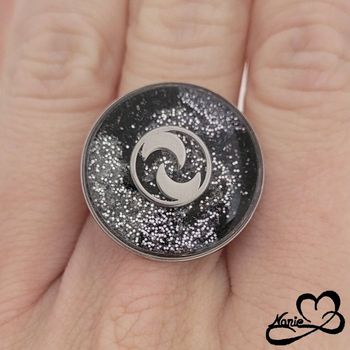 Bague ajustable ronde argentée et noire