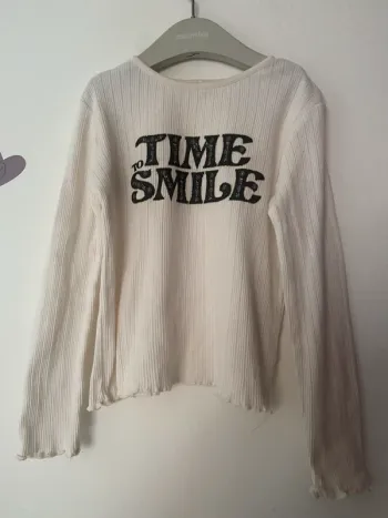 T-shirt manches longues .