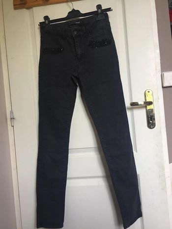Jean droit gris/ noir avec brillant miss captain en 34