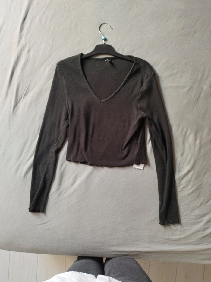 Pull léger et court noir taille M