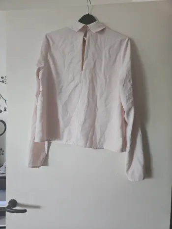 Haut femme légèrement rose