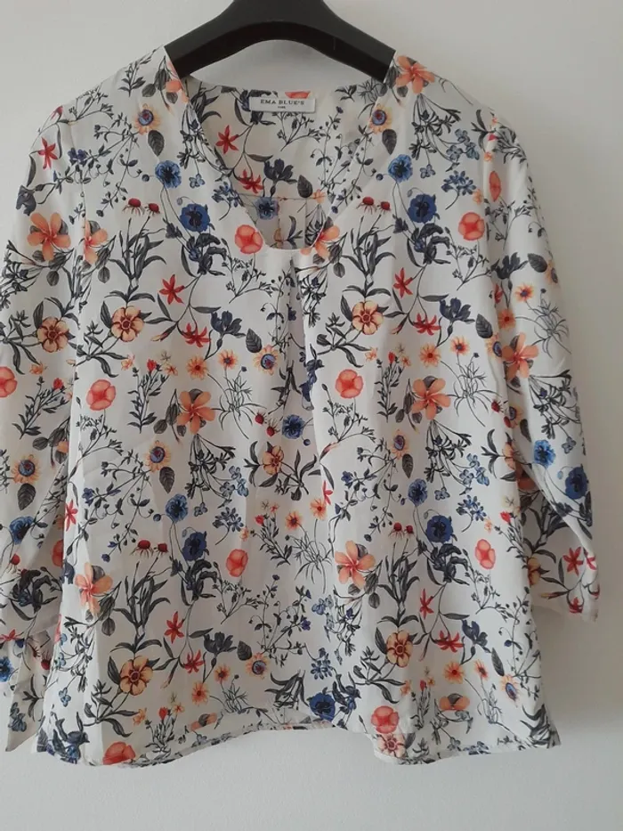 Blouse manches longues forme évasée