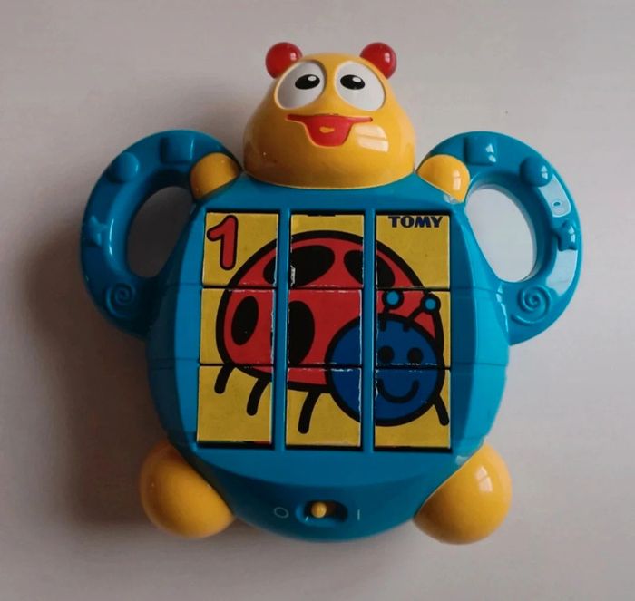 Abeille musicale puzzle en bon état