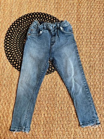 Jean acide bas effiloché