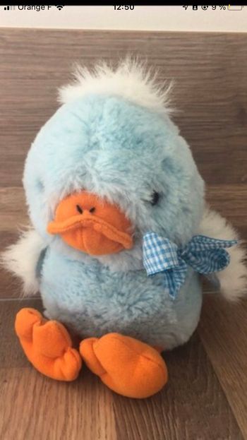 Petit poussin en peluche bleu