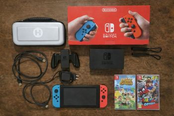 Console Nintendo Switch + 2 jeux