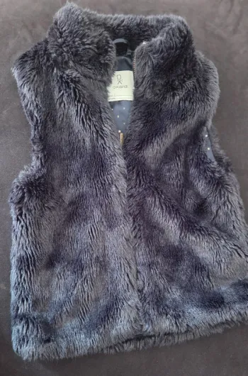 Gilet sans manche T.8 ans