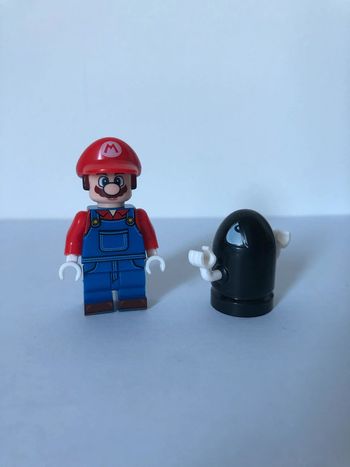 Figurine type lego Mario et la bombe missile. Super Mario