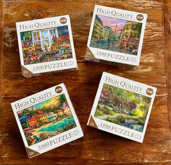 Lot de 4 puzzles 1000 pièces neuf sous blister