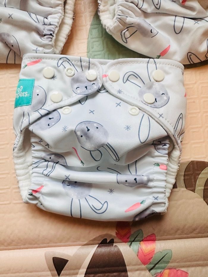 11 couches lavables Pampers dont 7 neuves - photo numéro 3