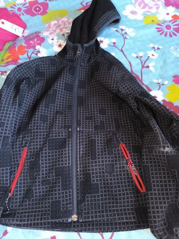 Veste imperméable..veste de pluie 8 ans