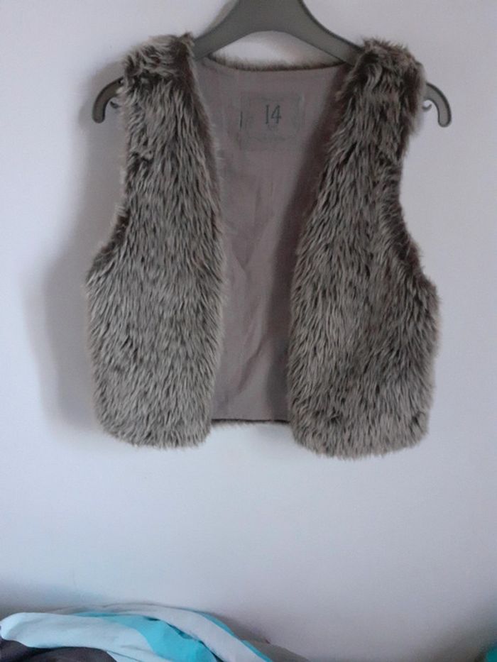 Gilet fourrure Gemo 14 ans