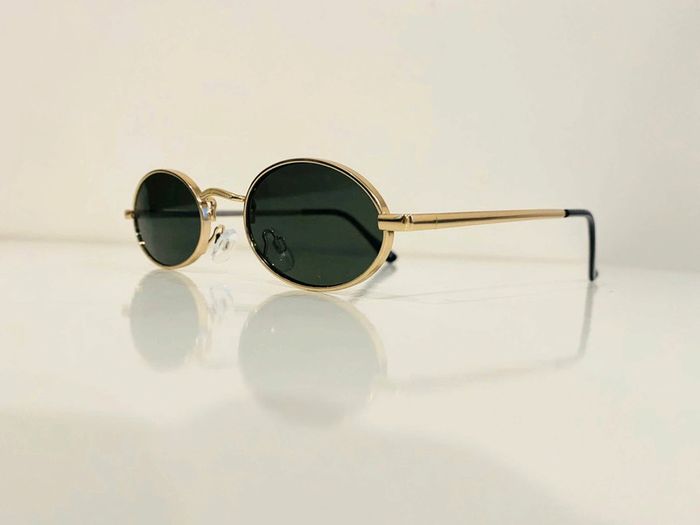 Lunette de soleil mixte ovale dorée verres verts uvprotection catégorie 3 taille moyenne - photo numéro 9