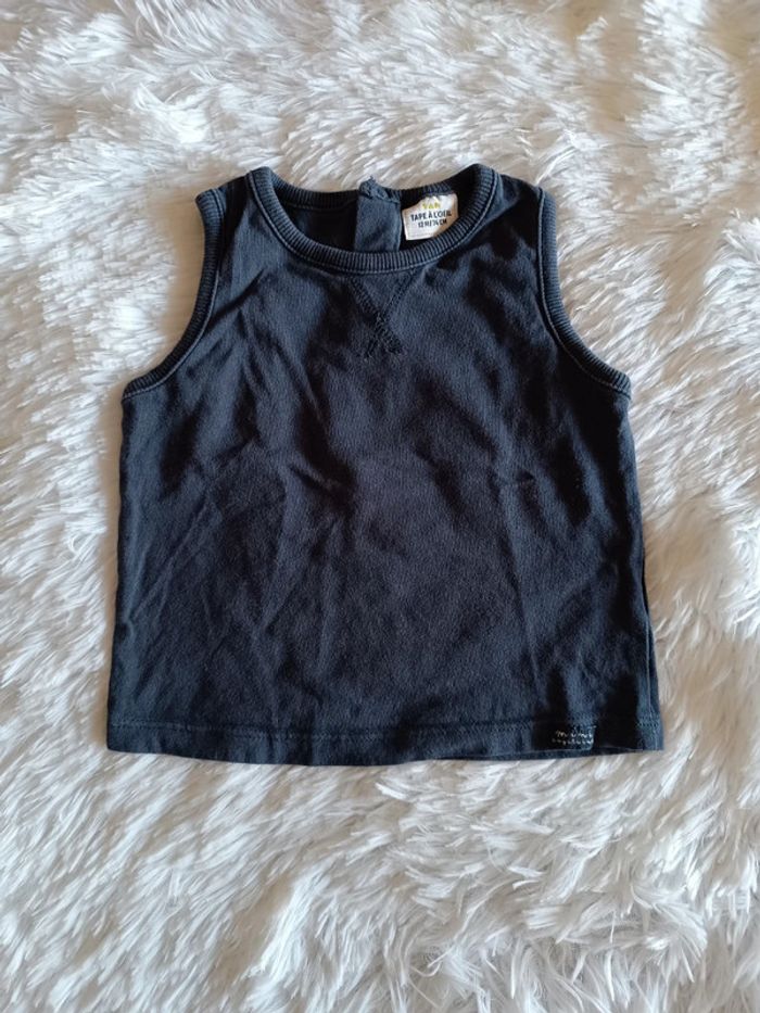 2€ Débardeur bleu marine T. 12 mois TAO