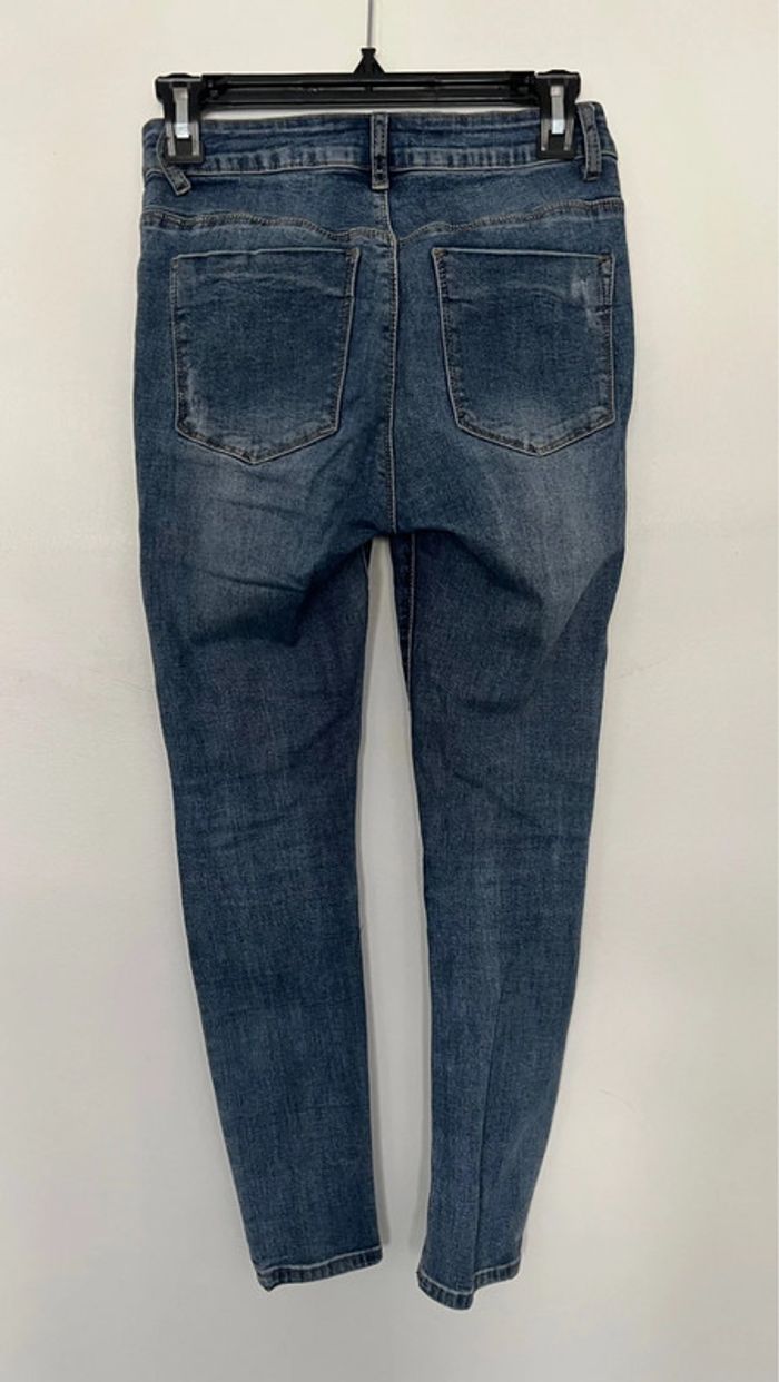 Jean troué en parfait état taille 38 marque miss bon coton polyester - photo numéro 4