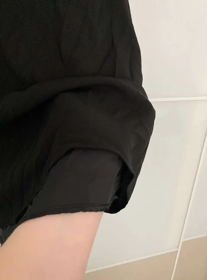 Top  sans manche  noir habillé - photo numéro 4