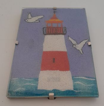 Tableau de sable phare  sous verre 10x15cm