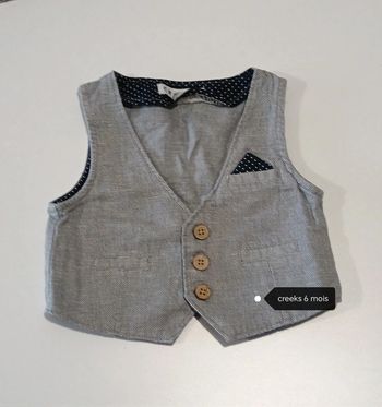 Boléro gris rayé