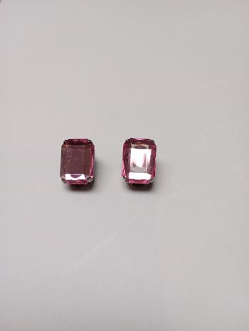 Fausses boucles d'oreille roses