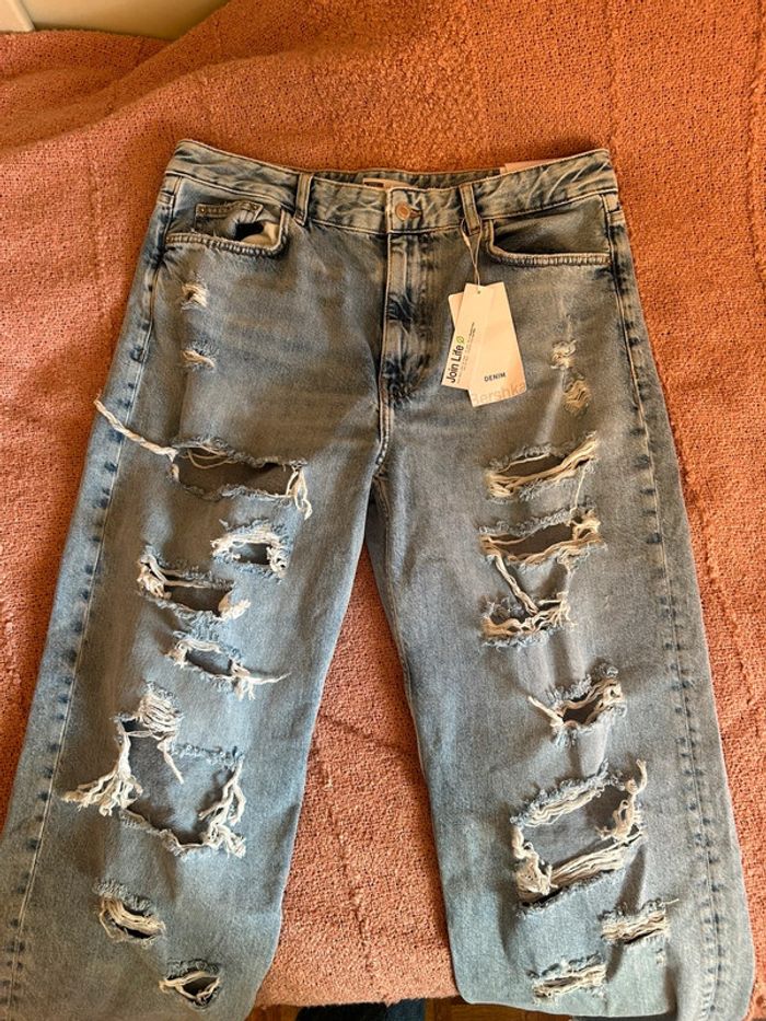 Jeans bleu clair effet déchiré • taille 42 - photo numéro 9