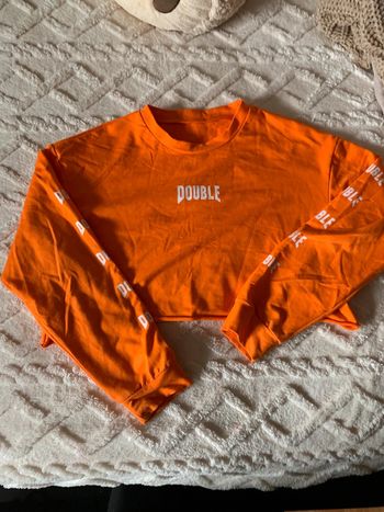 Pull court taille M