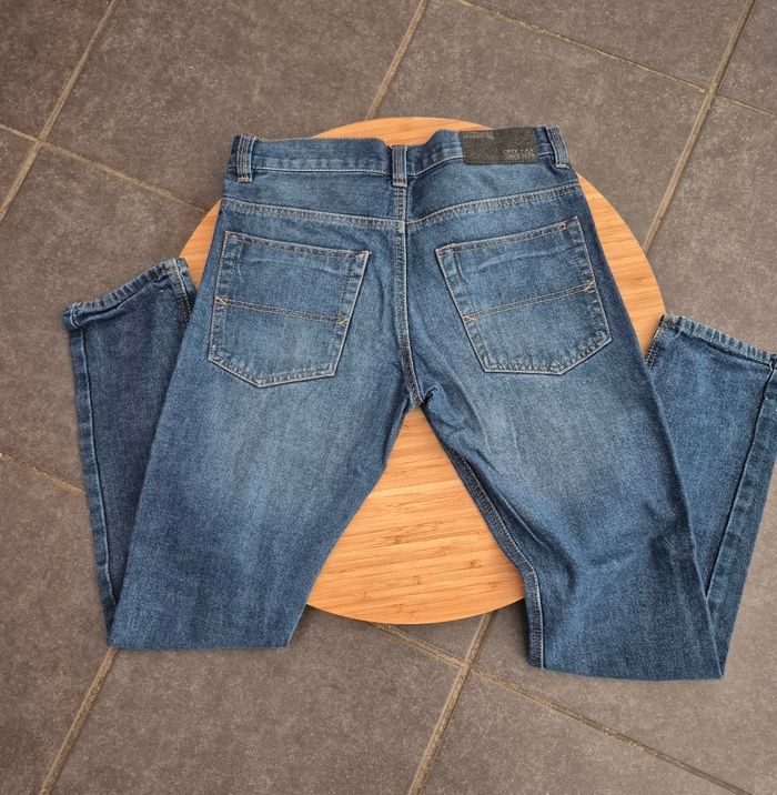 4 jeans garcon taille 12 ans tres bon etat - photo numéro 3