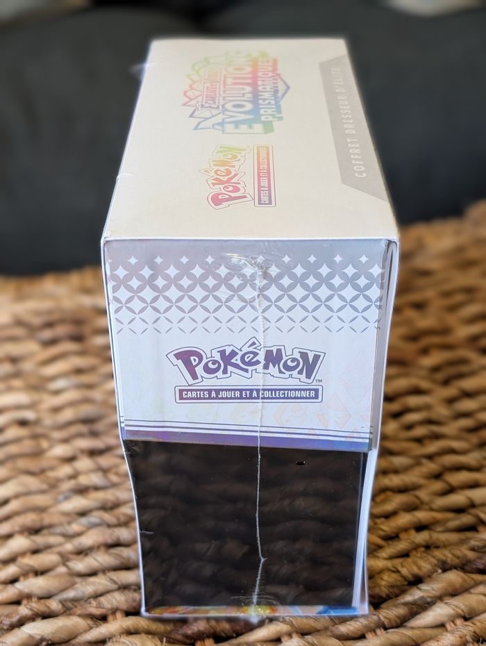 Coffret Pokémon ETB Coffret Dresseur d'élite Évolutions Prismatiques Evoli EV8.5 fr - photo numéro 4