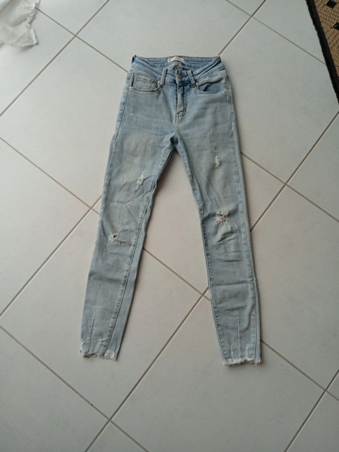 Jean skinny effet déchiré