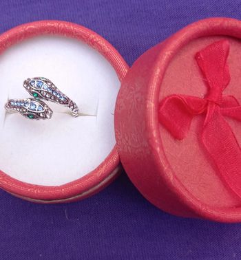 Bague argentée- 2 têtes de serpent et pierres