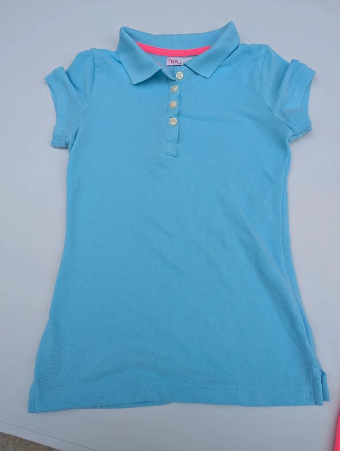 Polo bleu turquoise et fuschia taille 7-8 ans