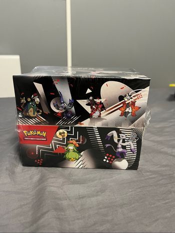 Display complète de Mini Tins Pokémon – Foudre Noire & Flamme Blanche