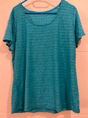 T shirt turquoise en tres bon état taille 46/48