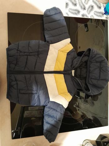 Manteau tape à l'œil