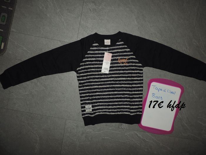 pull sweat tape à l'oeil taille 8 ans