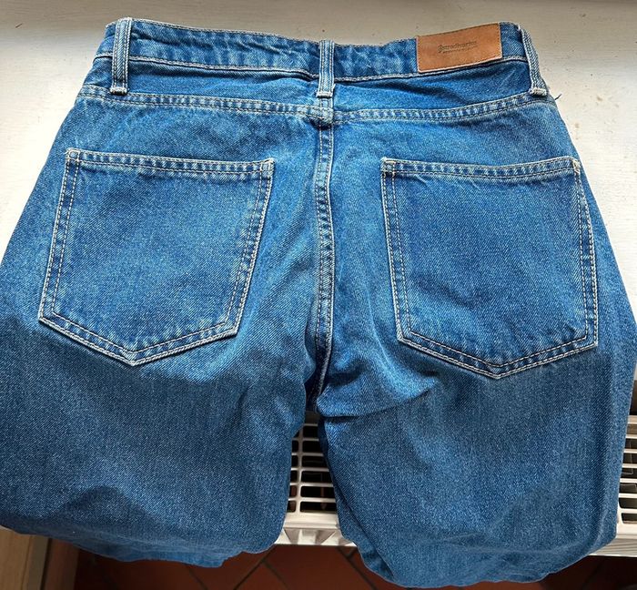 482 - jeans bleu foncé avec braguette à boutons et retaillé - photo numéro 2