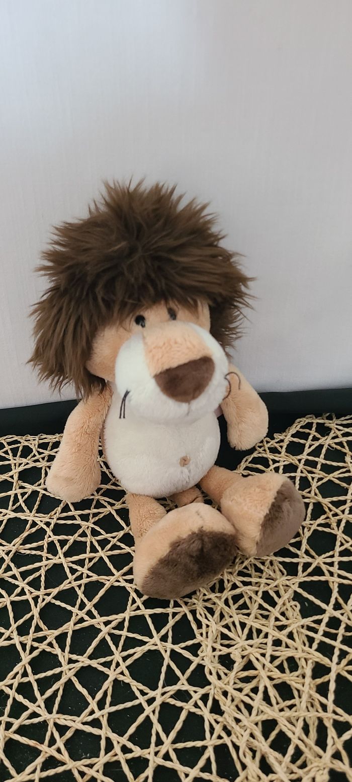 Peluche Nici Lion avec capuche 25 cm