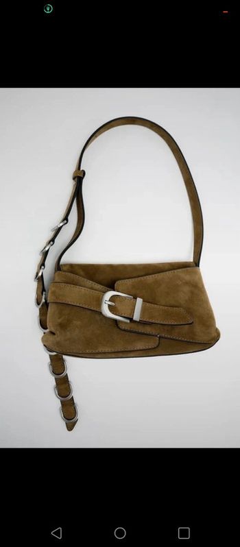 Petit sac en daim vert kaki style vintage porté épaule