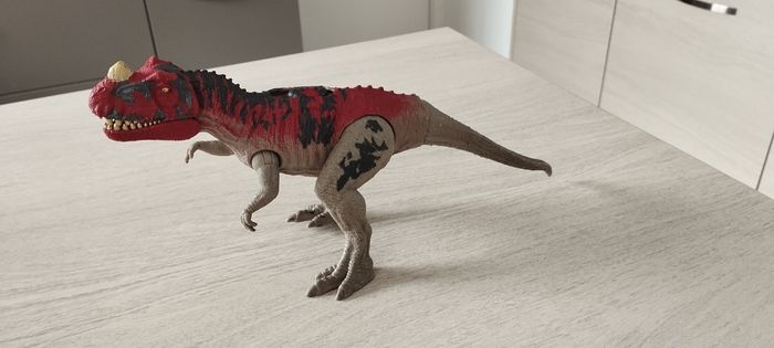 Dinosaure a pile
