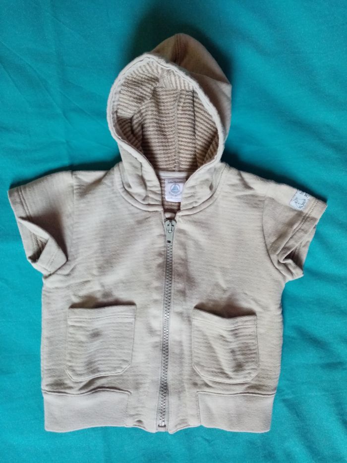 Veste sans manches à capuche