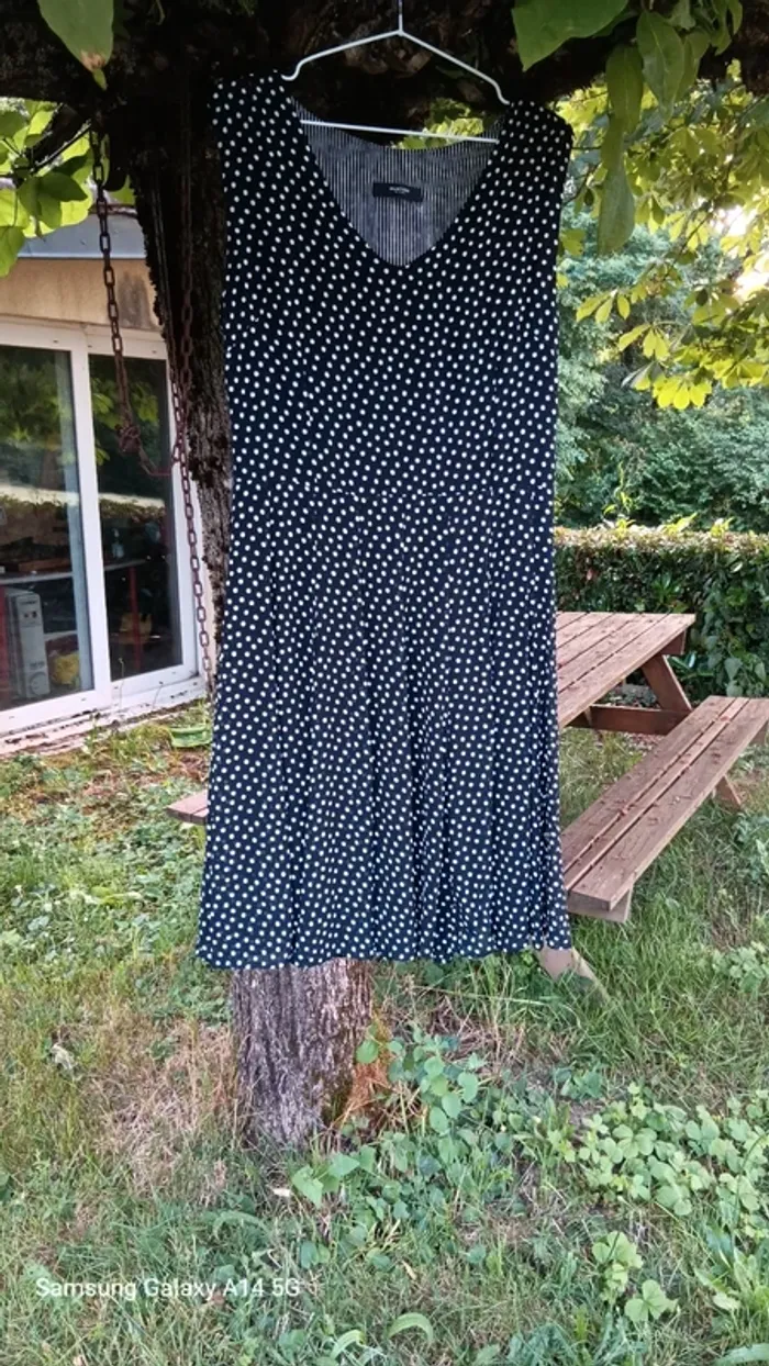 Robe noire petits pois blancs