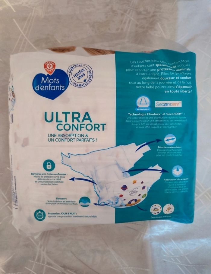Paquet de 39 couches taille 5 marque mots d'enfants avec boîte de 50 sacs a couches parfumés - photo numéro 3