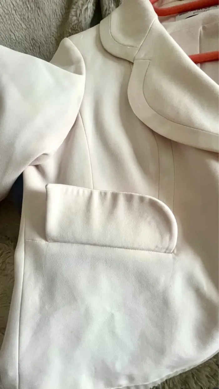 La veste - photo numéro 5