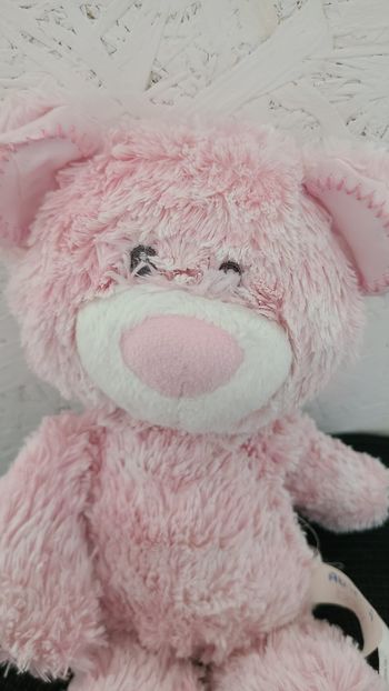 Peluche Huggie AURORA World, bébé ours