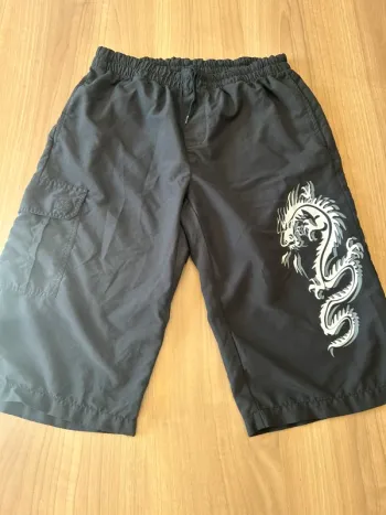 Très beau short rainbow taille 44